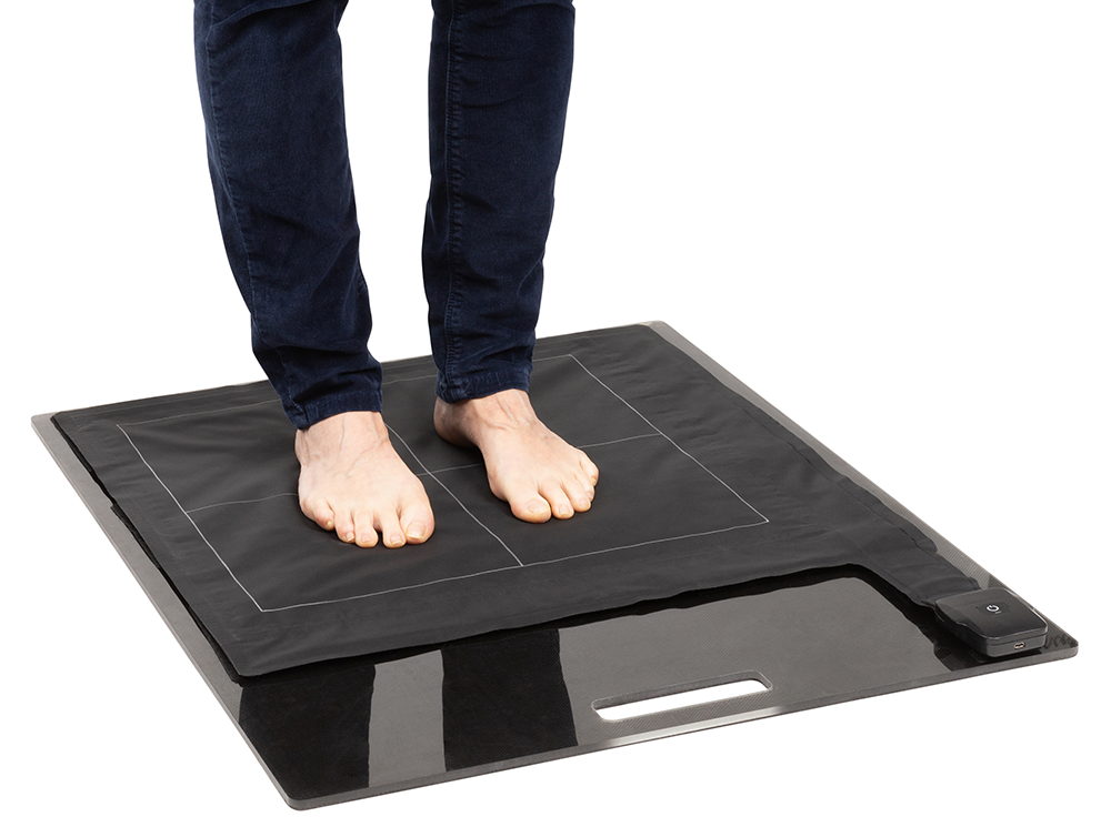 XSENSOR's Stance Pad Sensor capturing plantar pressure of a patient standing on the device. XSENSOR's Stance Pad Sensor capturing plantar pressure of a patient standing on the device.