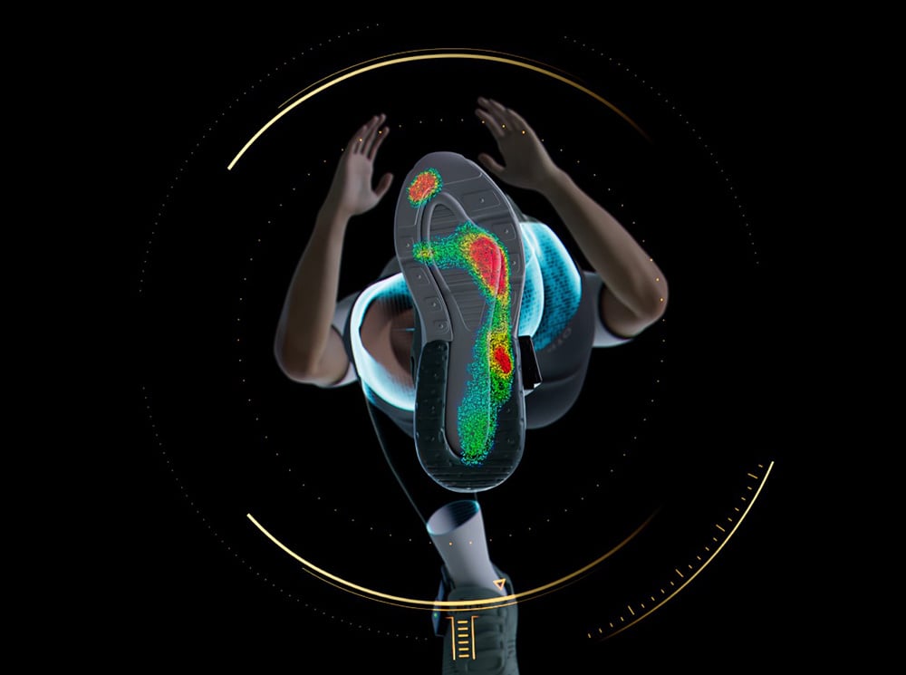 Bottom-up view of a person running and their plantar pressure showing beneath their foot.