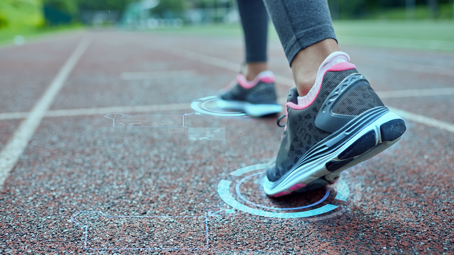 Person wearing athletic training shoes walking.