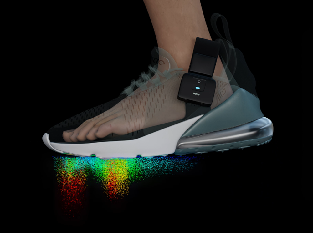 A person's foot inside a running shoe with XSENSOR's Intelligent Insoles system showing plantar pressure map. A person's foot inside a running shoe with XSENSOR's Intelligent Insoles system showing plantar pressure map.