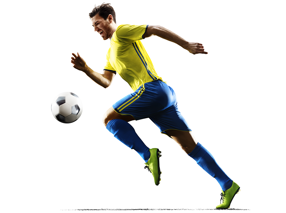 A soccer player going for the ball.