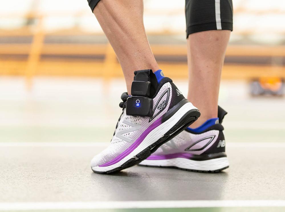 Pair of athletic training shoes with XSENSOR's X4 Intelligent Insole sensors inside.